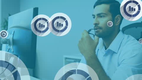 Businessman Analyzing Online Statistics with Digital Interfaces