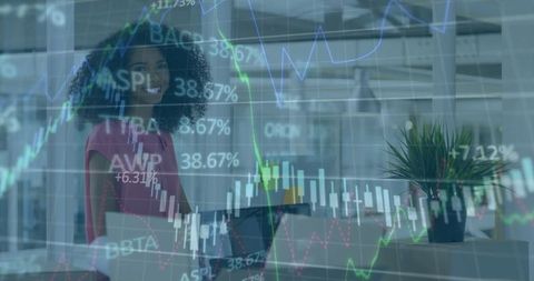Smiling Businesswoman With Stock Market Chart Overlay in Office