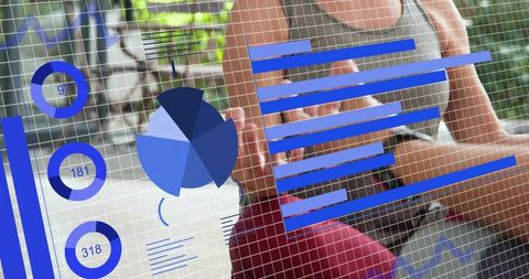 Pair sitting outdoors viewing fitness data overlay with charts and activewear focus
