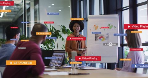 Diverse Team Discussing Business with Digital Media Icons Overlay