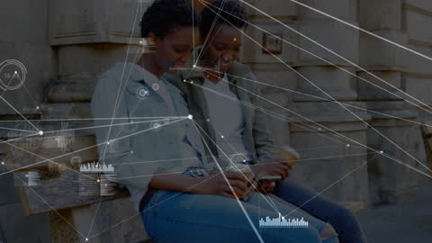 Friends Utilizing Technology with Digital Network Overlays