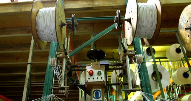 Industrial Textile Machinery with Spools in a Factory - Download Free Stock Images Pikwizard.com