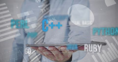 business professional analyzing programming languages on tablet - Download Free Stock Images Pikwizard.com