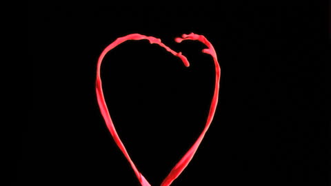 Pink Paint Splash Creating Heart Shape in Slow Motion