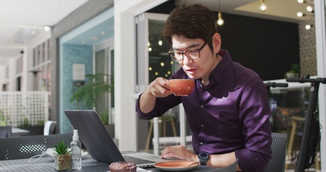 Businessman Working while Drinking Coffee at Outdoor Cafe - Download Free Stock Images Pikwizard.com