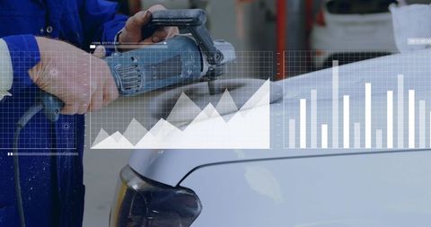 Auto technician sanding car hood with orbital sander and digital performance data overlay