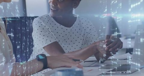 Professional Women Collaborating on Digital Innovation