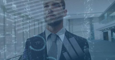 Businessman with Financial Data Overlay in Modern Office - Download Free Stock Images Pikwizard.com