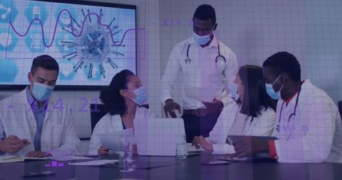 diverse medical team analyzing digital health data at meeting - Download Free Stock Images Pikwizard.com