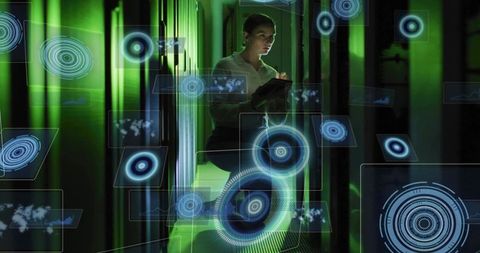 Female it technician scanning server racks holding tablet using holographic data interface