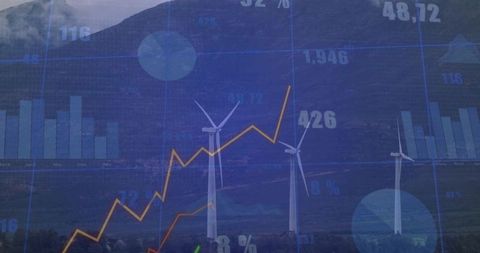 Wind turbines rising with growth charts overlay tracking renewable energy trends