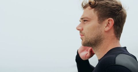 Serene Male Surfer Enjoying Ocean View