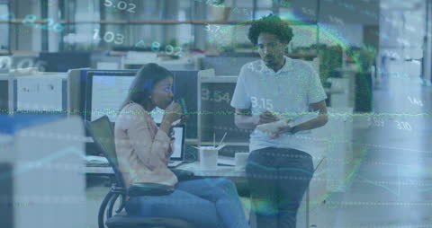 Diverse Businesspeople Collaborating with Financial Data Interfaces