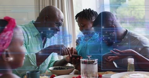 Multigenerational family gathering around smartphone with augmented reality overlay