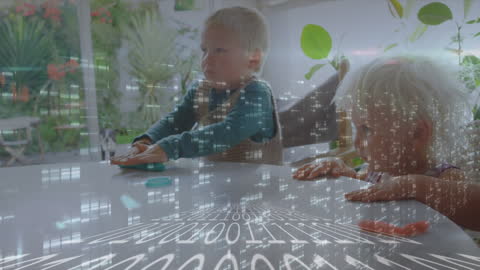 Children Creating with Clay While Engaging in Technology