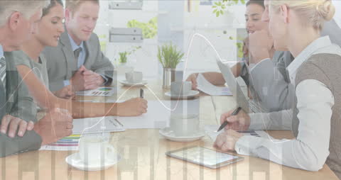 Diverse Business Team Collaborating Over Financial Data