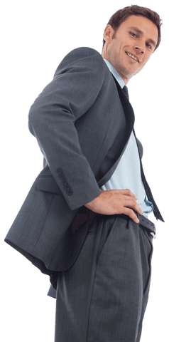 Cheerful Businessman Standing with Hands on Hips in Suit