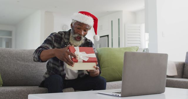 Older Man Surprised by Christmas Gift During Virtual Celebration - Download Free Stock Images Pikwizard.com