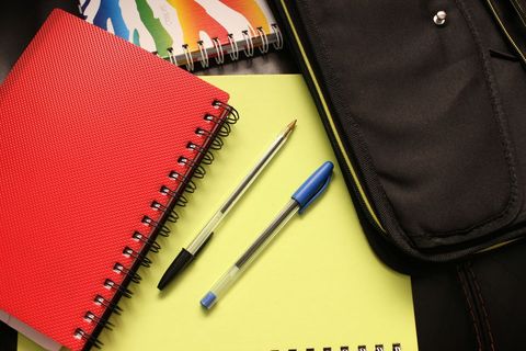 Office Supplies and Notebooks with Pencils and Pens