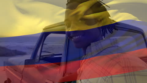 Colombia Flag and Smiling Man Overlaid on Beach Background