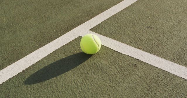 Tennis Ball on Floor with Shadow in Sunlight - Download Free Stock Images Pikwizard.com