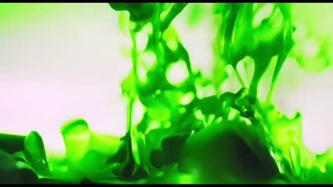 Dynamic Green Liquid Motion on White Background