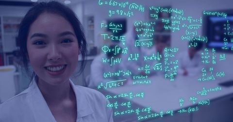 Smiling student in science lab with mathematical equations overlay