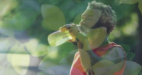 African American Man Hydrating During Outdoor Fitness