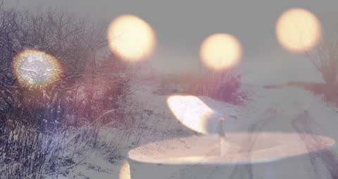 Double Exposure of Winter Landscape and Cozy Candlelight