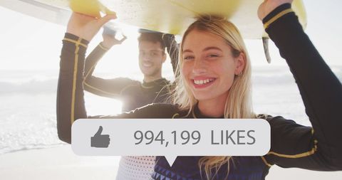 Happy Surfers Celebrating Social Media Success on Beach