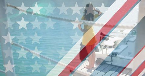 Patriotic Woman on Pier Overlooking Tranquil Waterbody