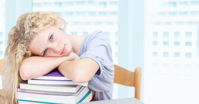 Teenage Girl Resting on Stack of Books in Bright Room - Download Free Stock Photos Pikwizard.com