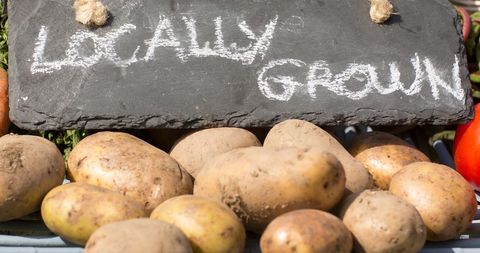Organic Locally Grown Potatoes Displayed at Outdoor Market - Download Free Stock Images Pikwizard.com