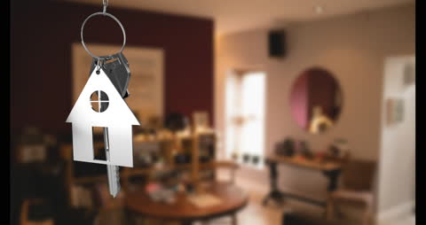 House Keychain Hanging with Blurred Homely Background