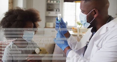 Doctor holding syringe with vial near child holding teddy bear