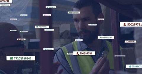 Warehouse Worker Inspecting with Digital Interface Integration