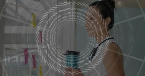 Businesswoman Brainstorming with Coffee and Sticky Notes in Office