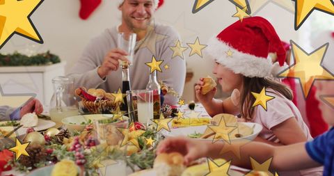 Festive Family Celebrating Christmas with Santa Hats