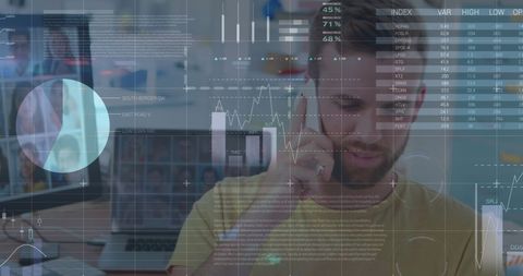 Caucasian man analyzing data on smartphone in modern office