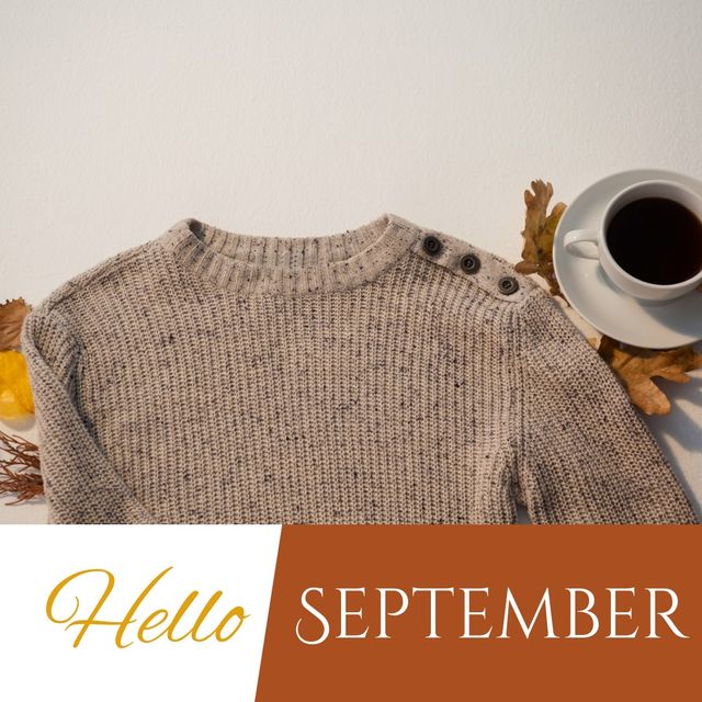 Composite of hello september text with sweater, coffee cup and maples leaves on white background. Copy space, drink, warm clothing, autumn season and nature concept.