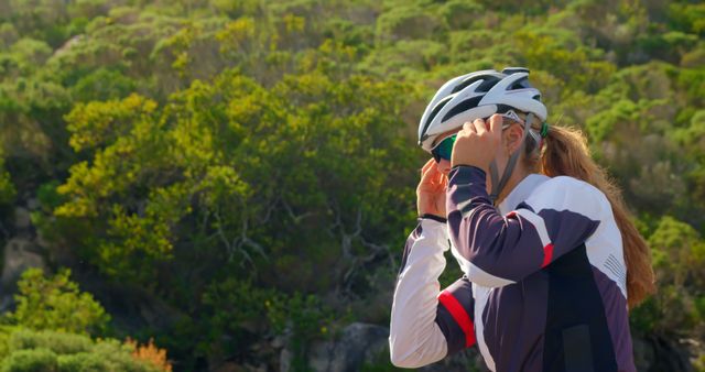 Female Cyclist Preparing Adventure Outdoor - Download Free Stock Images Pikwizard.com