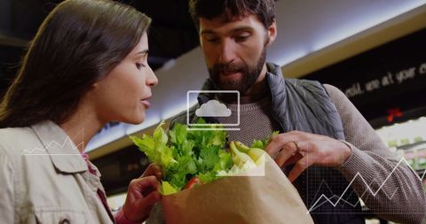 Couple grocery shopping with data graphics
