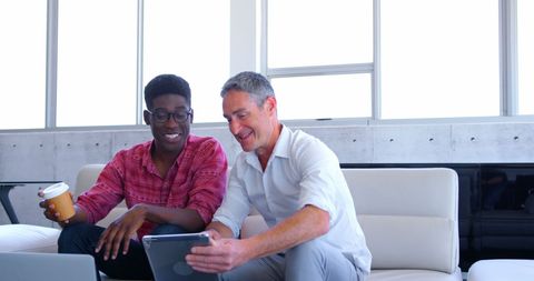 Diverse Executives Collaborating in Modern Office