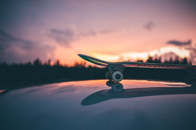 Skateboard on Car Roof with Beautiful Sunset Sky - Download Free Stock Photos Pikwizard.com