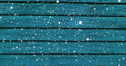 Snowy Charm: Cascading Snowflakes on Blue Wooden Boards - Download Free Stock Images Pikwizard.com