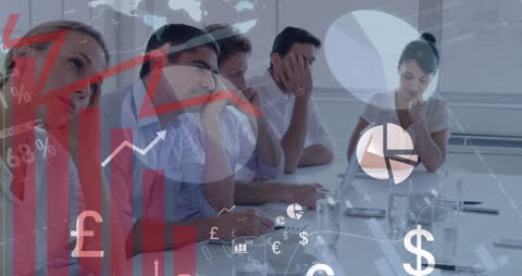 Business Team Analyzing Financial Data with Graphs and Charts