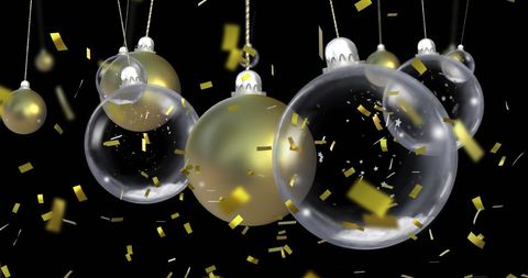 Elegant Christmas Baubles with Gold Confetti Against Black Background