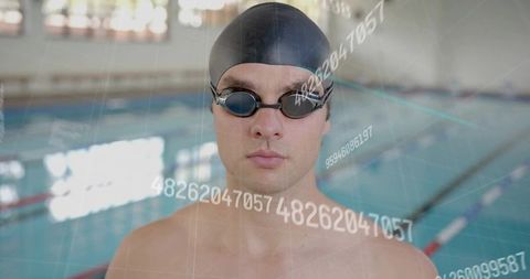Swimmer Analyzing Digital Metrics for Performance Enhancement