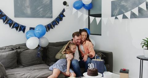 Family Celebrating Father's 30th Birthday with Love and Joy
