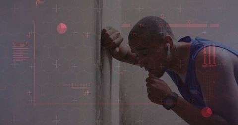 Tired runner leaning forehead on concrete wall after intense training with fitness hud overlay